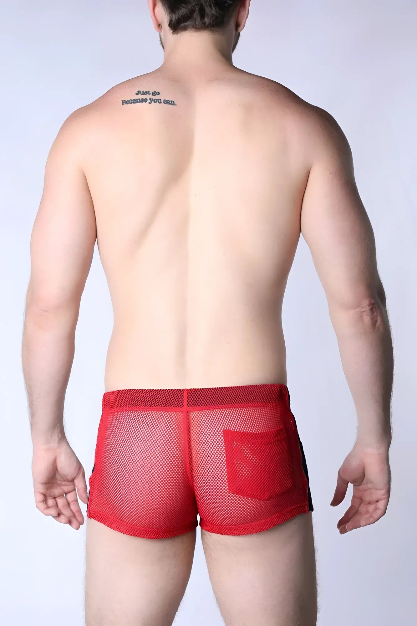 Red mesh briefs with black side panel and front pocket from chain reaction mesh short collection