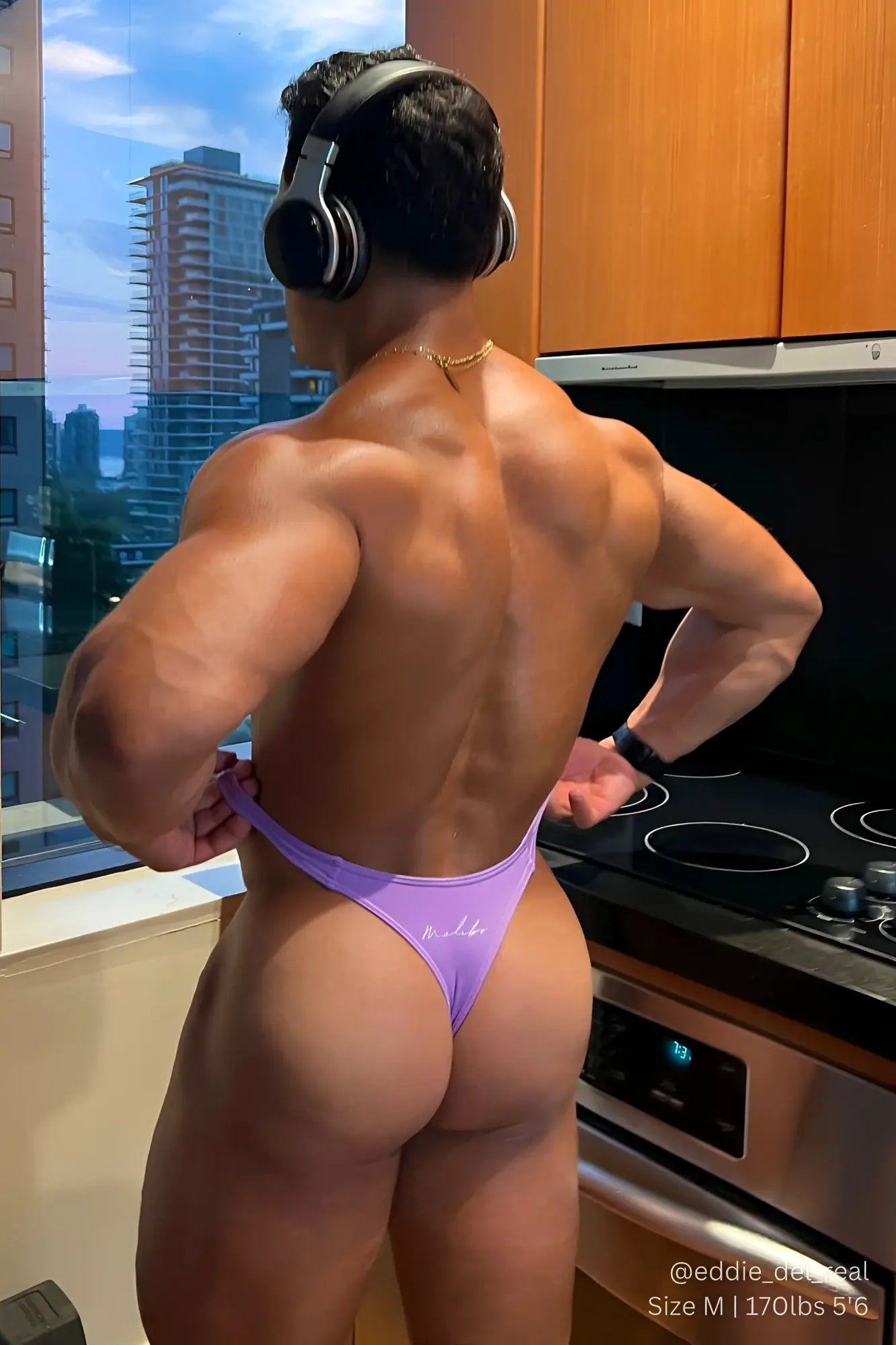 Purple cheeky classic g-string thong with white embroidered logo in digital violet color showing front view
