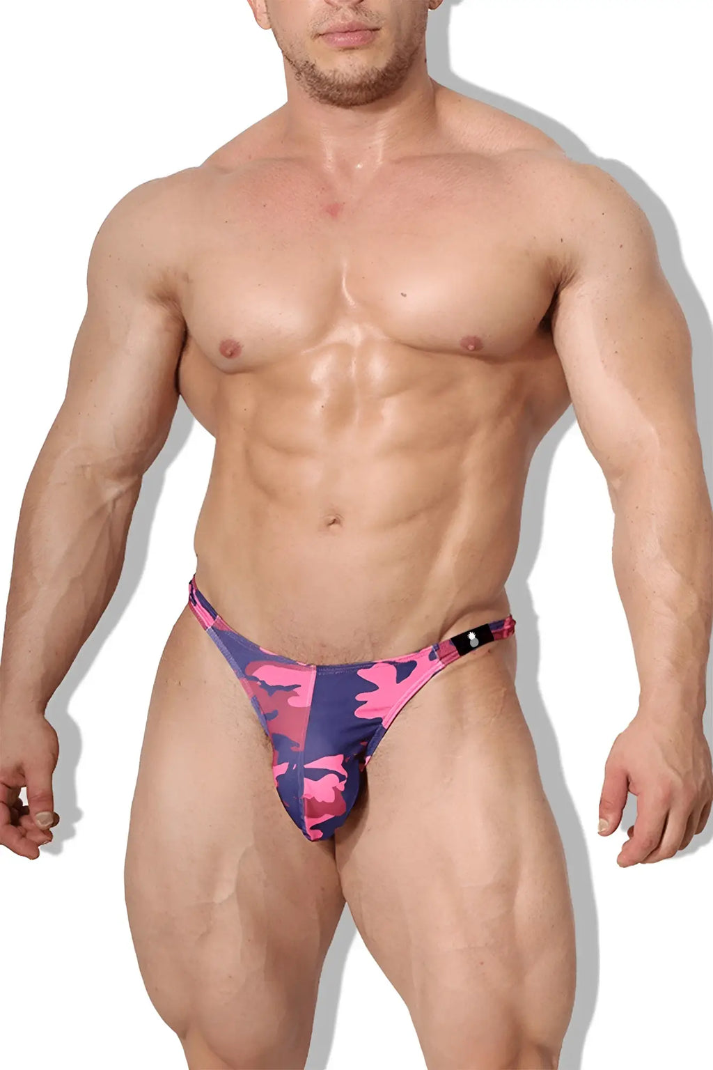 Pink and navy blue camouflage cheeky classic g-string thong briefs with black logo on the sideband visible from the back