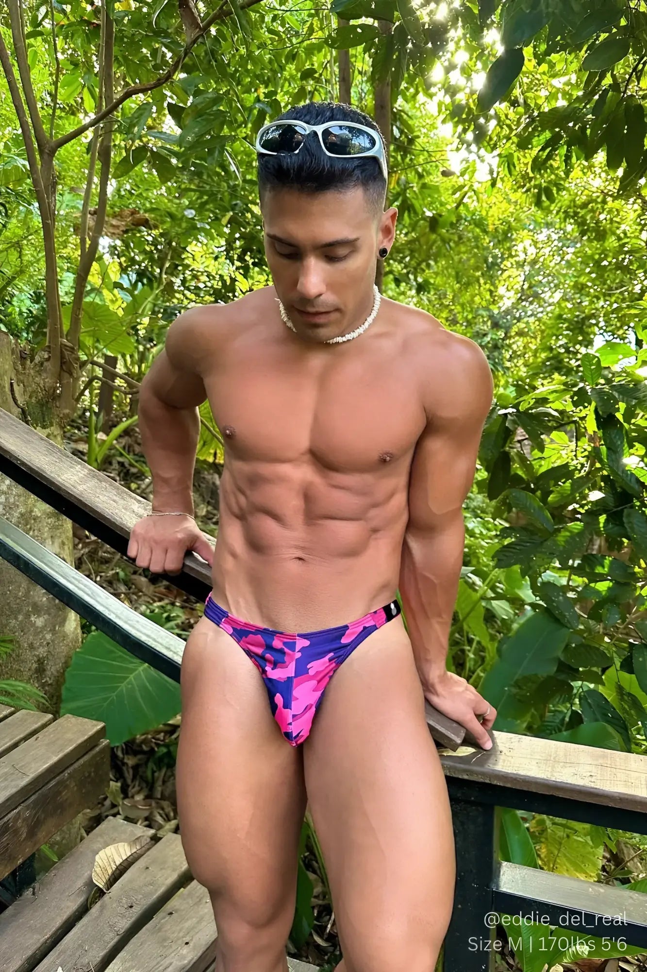 Cheeky classic g-string thong in vibrant pink and purple camouflage pattern designed as men’s briefs