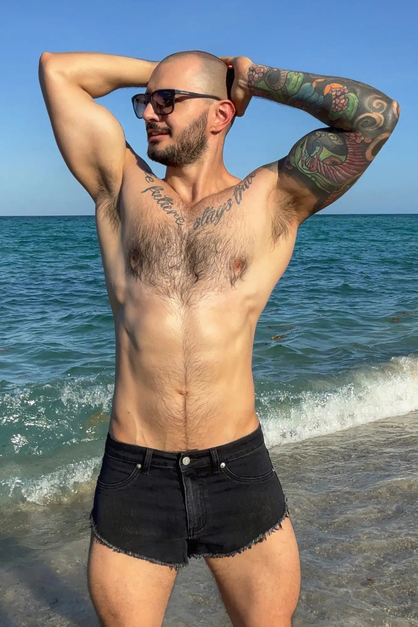Black denim cheeky summer 2.5 inch brief shorts with frayed hem perfect for casual summer wear