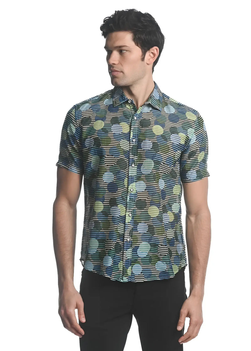 A men’s short-sleeved cotton silk shirt with vibrant green blue yellow circles pattern on dark base fabric