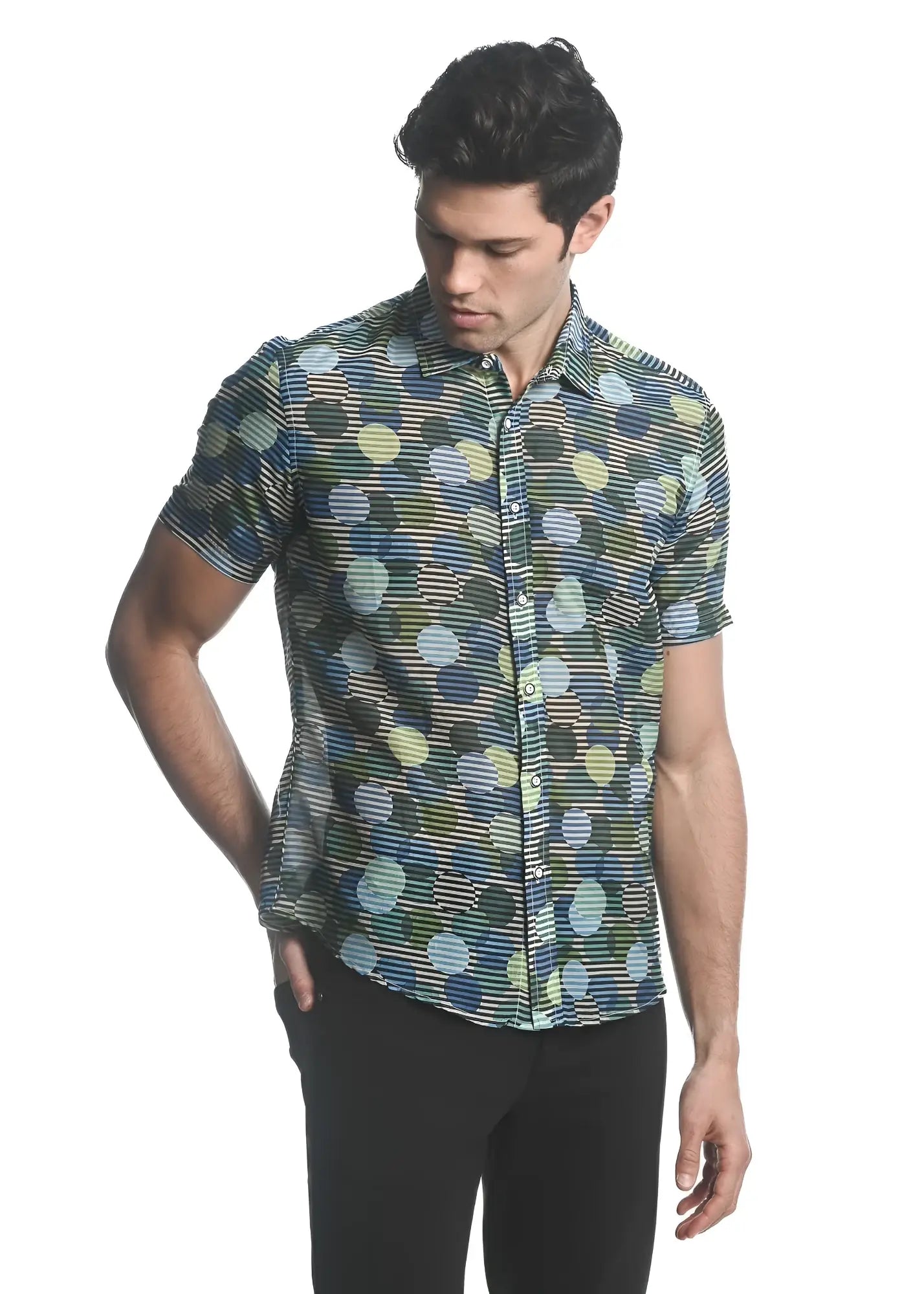 A men’s short-sleeved cotton silk shirt with a vibrant blue green and yellow circle pattern on dark fabric