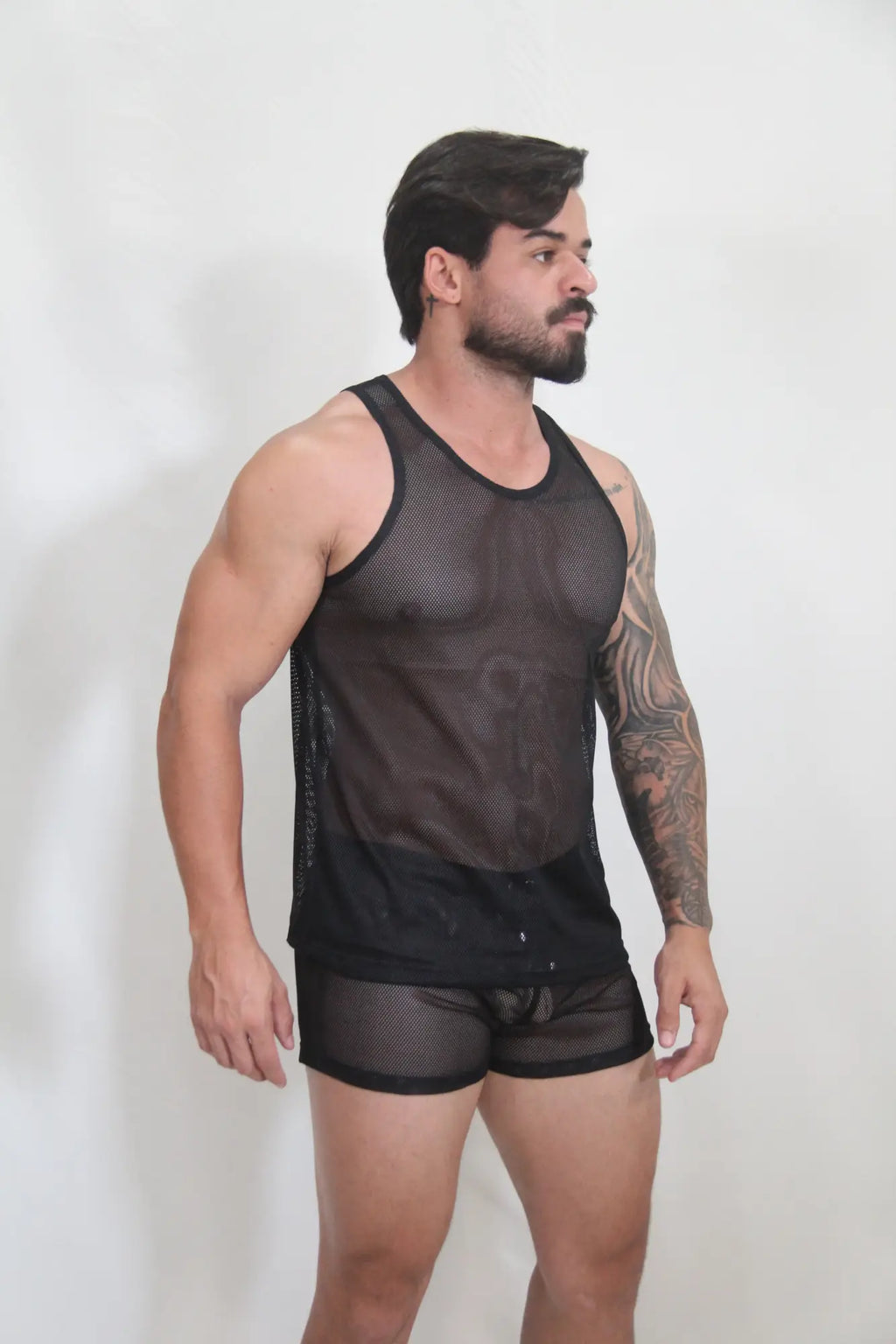 Black mesh tank top with solid black bottom hem and side panels from circuit mesh tanks 4 colors available