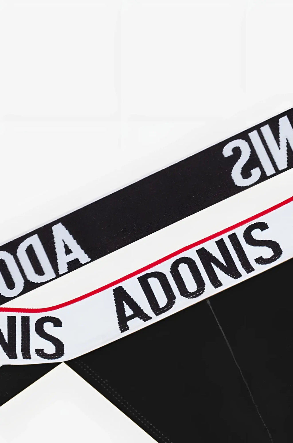 Classic black jockstrap with black and white striped waistband featuring bold adonis branding and a thin red line
