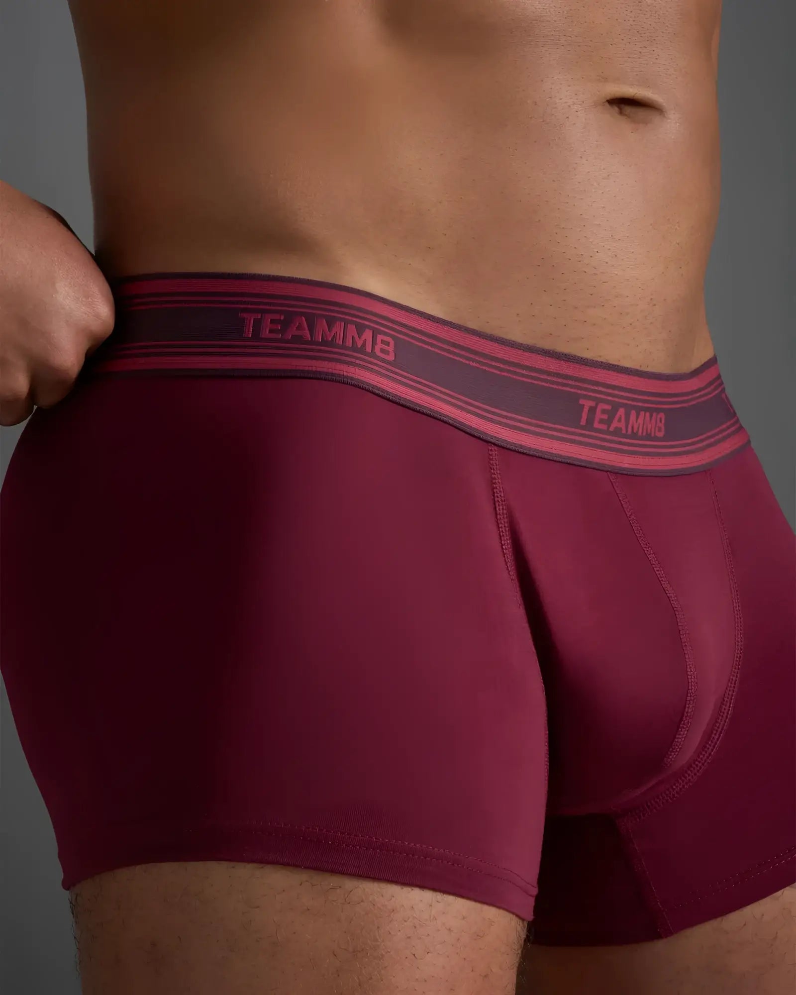 Classic cotton trunk maroon boxer briefs with contrasting pink and dark gray elastic waistband featuring brand name
