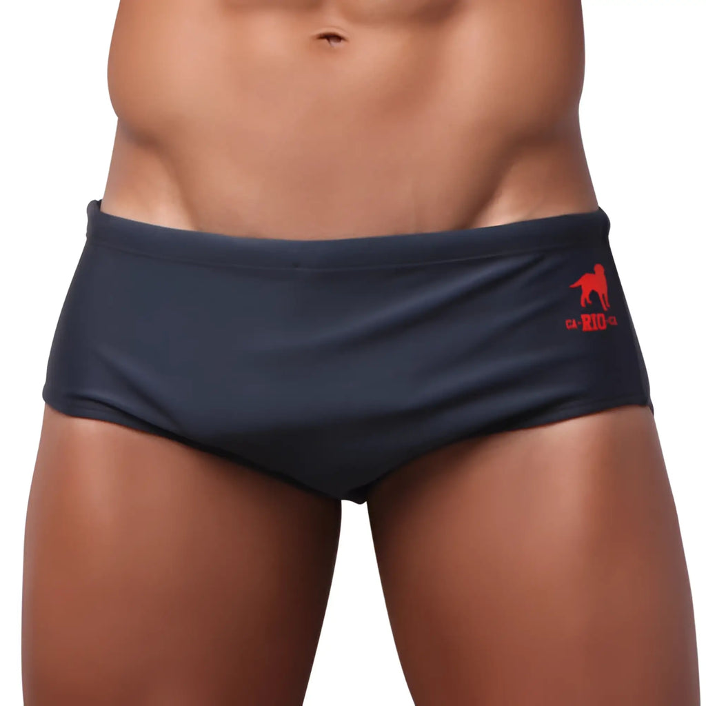Dark navy blue classic cut solids sunga swim trunks with red dog logo and rio text on waistband for men