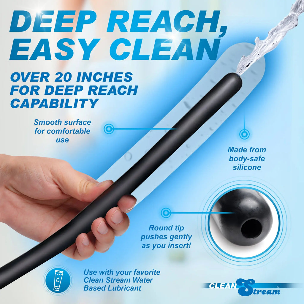CleanStream 20-inch black silicone enema nozzle attachment, held by hand, highlighting smooth surface and round tip.
