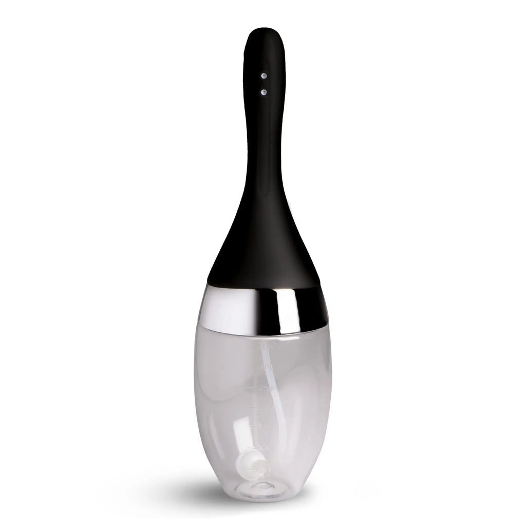 CleanStream Auto-Vibrating Enema Bulb: A black silicone nozzle on a silver base with a clear, graduated liquid reservoir.