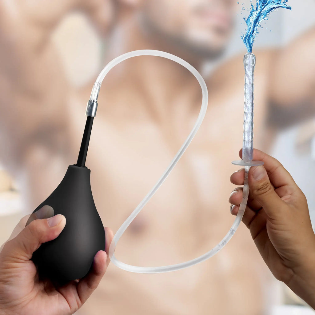 CleanStream Enema Bulb Kit: A black rubber bulb with a clear hose spraying water from a ridged nozzle.