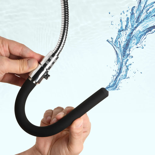 CleanStream EZ-Flow Silicone Shower Enema Set with a black silicone nozzle spraying water from a metallic hose.