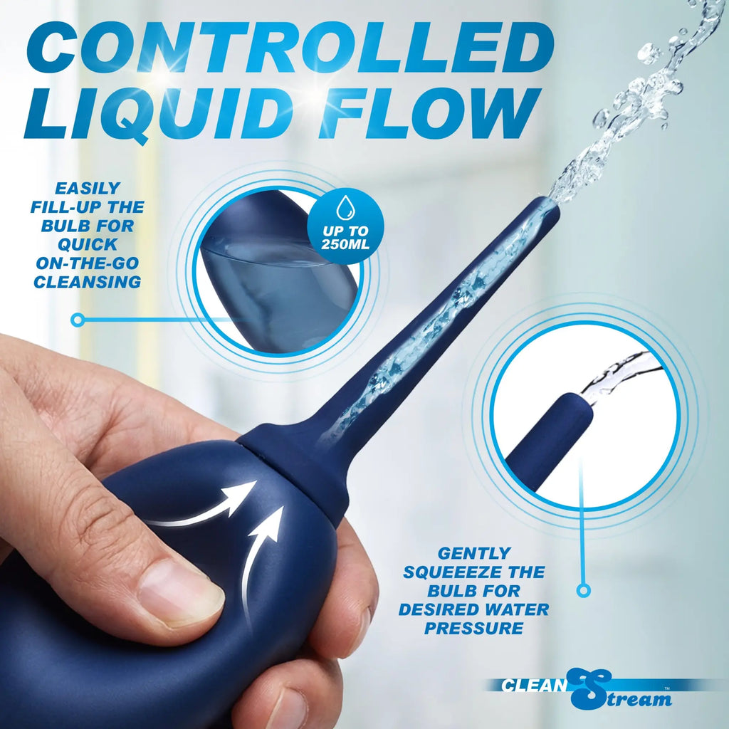 CleanStream Flex Tip Enema Bulb: A dark blue, flexible bulb being squeezed to release a controlled stream of water.