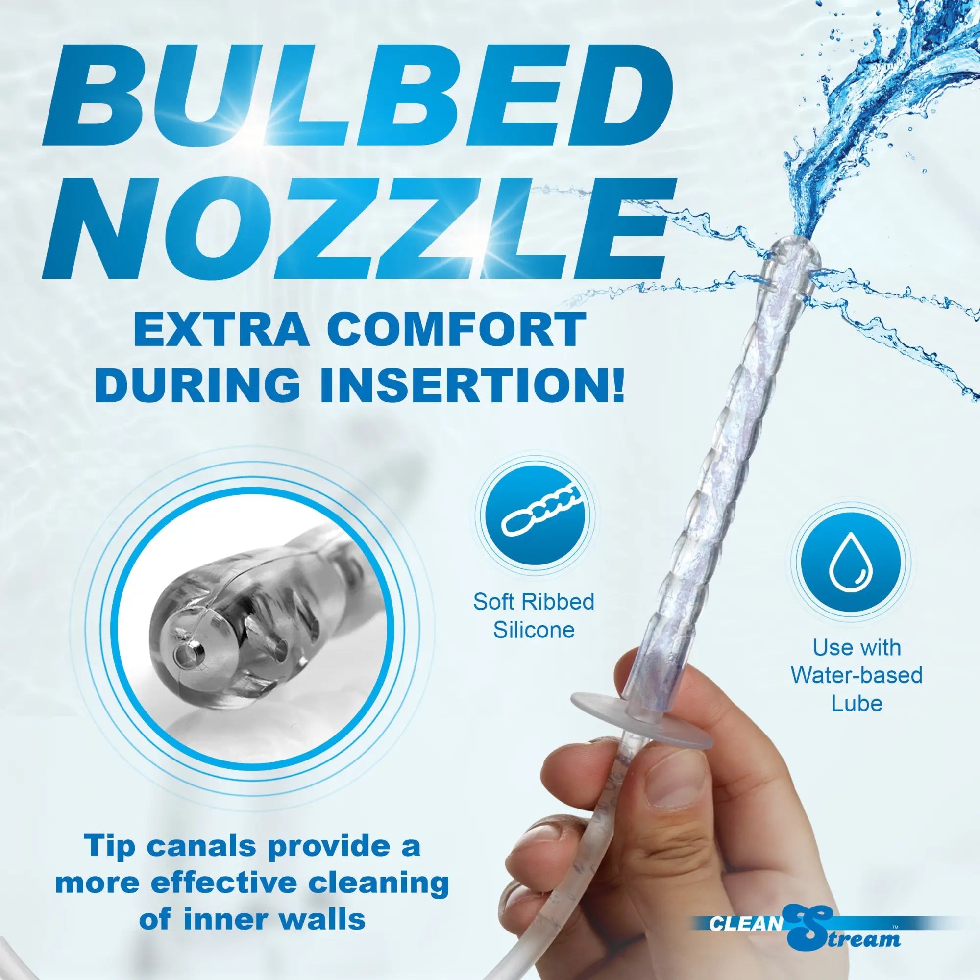 CleanStream Enema Bottle clear, ribbed silicone nozzle being held, showing water spraying from the tip.