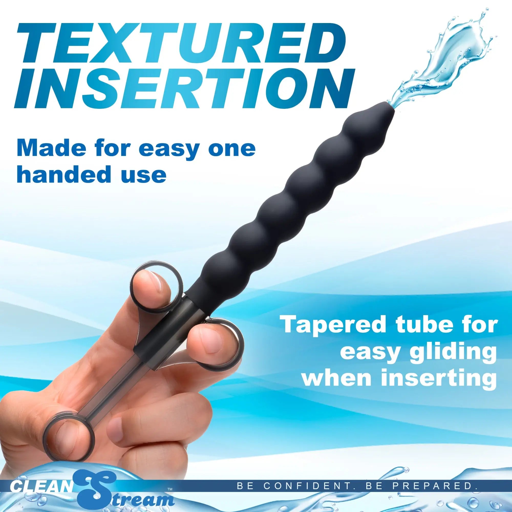 CleanStream Silicone Beaded Lubricant Launcher: a black, textured, syringe-style tool held by a hand, spraying water.