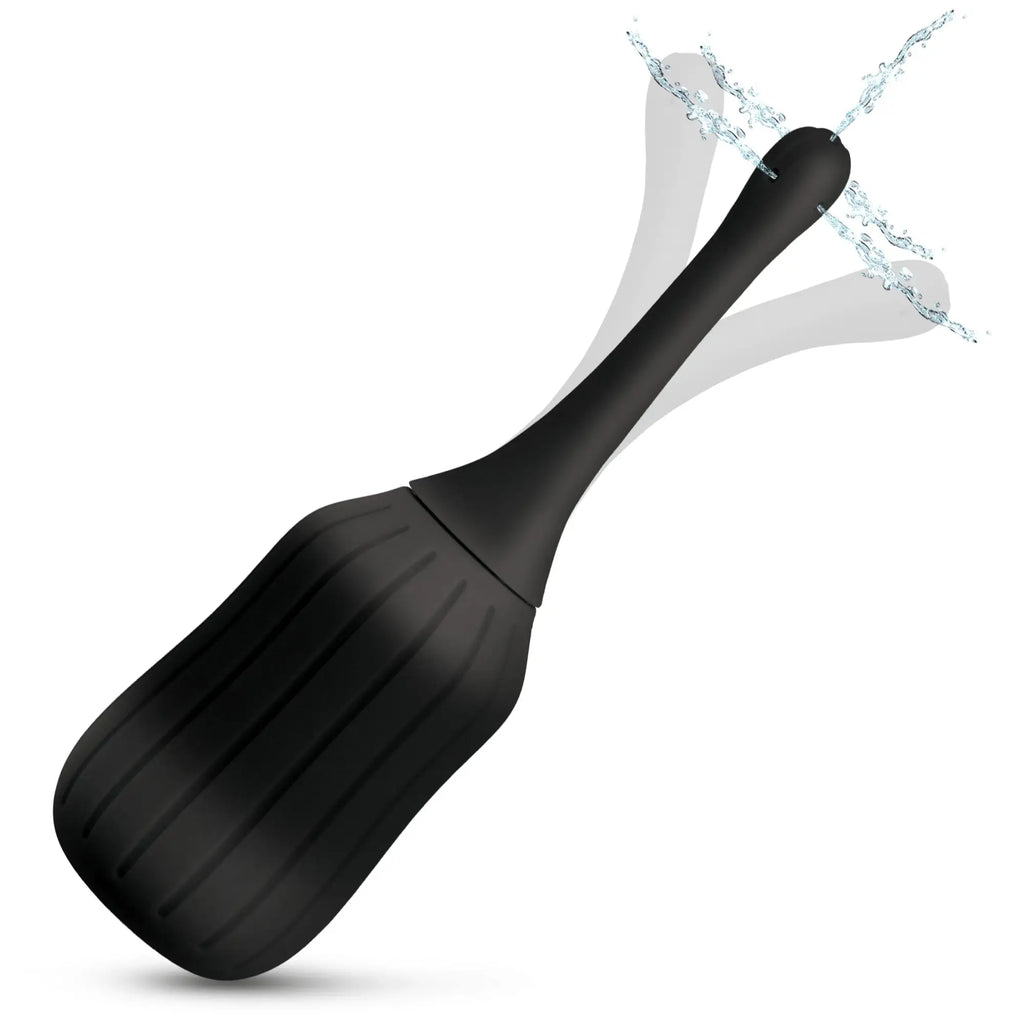 CleanStream black silicone enema bulb with a poseable nozzle shown spraying water at different angles.