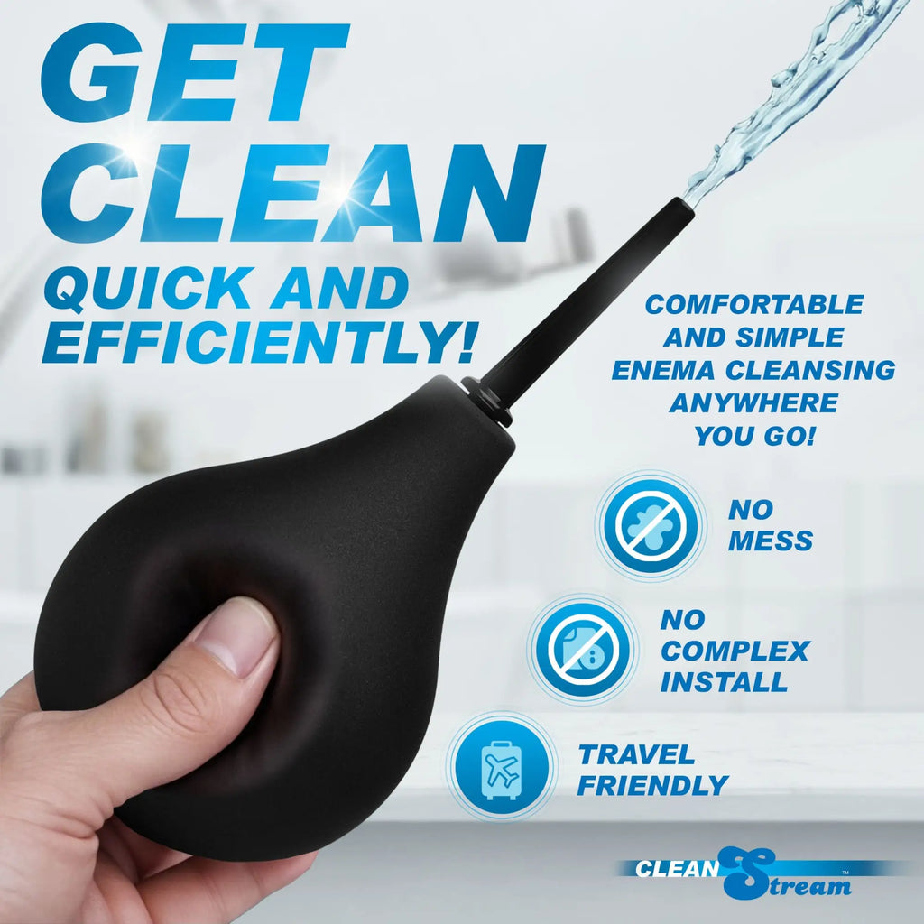 CleanStream Thin Tip Enema Bulb: A hand squeezes a black, pear-shaped bulb with a thin tip spraying water.