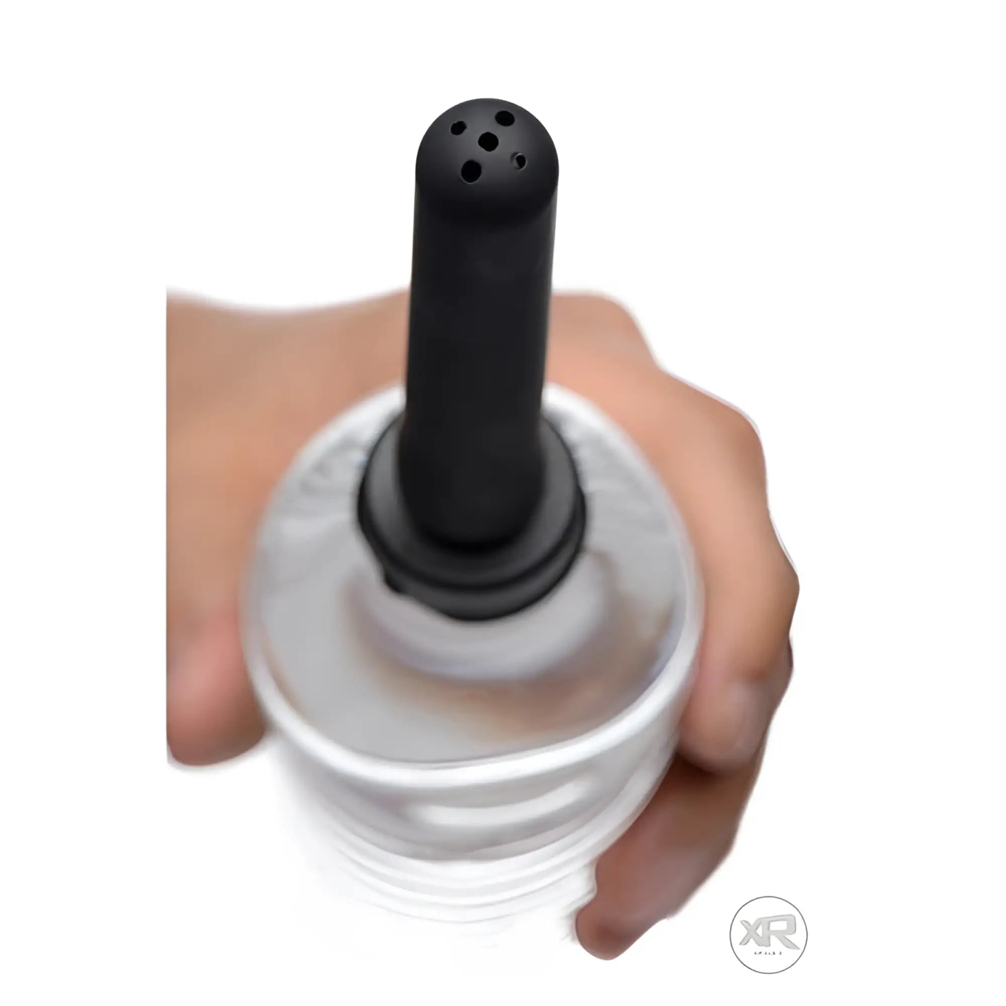 CleanStream Travel Enema bottle adapter featuring a black, rounded nozzle attached to a clear plastic water bottle.