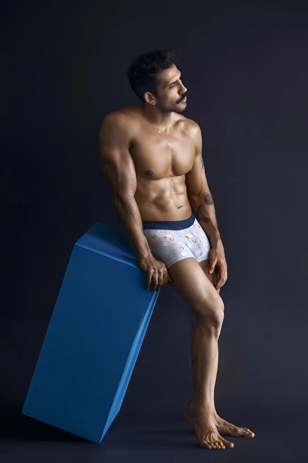 White boxer briefs clever 1723 coney trunks with subtle floral pattern and solid navy blue waistband in blue color