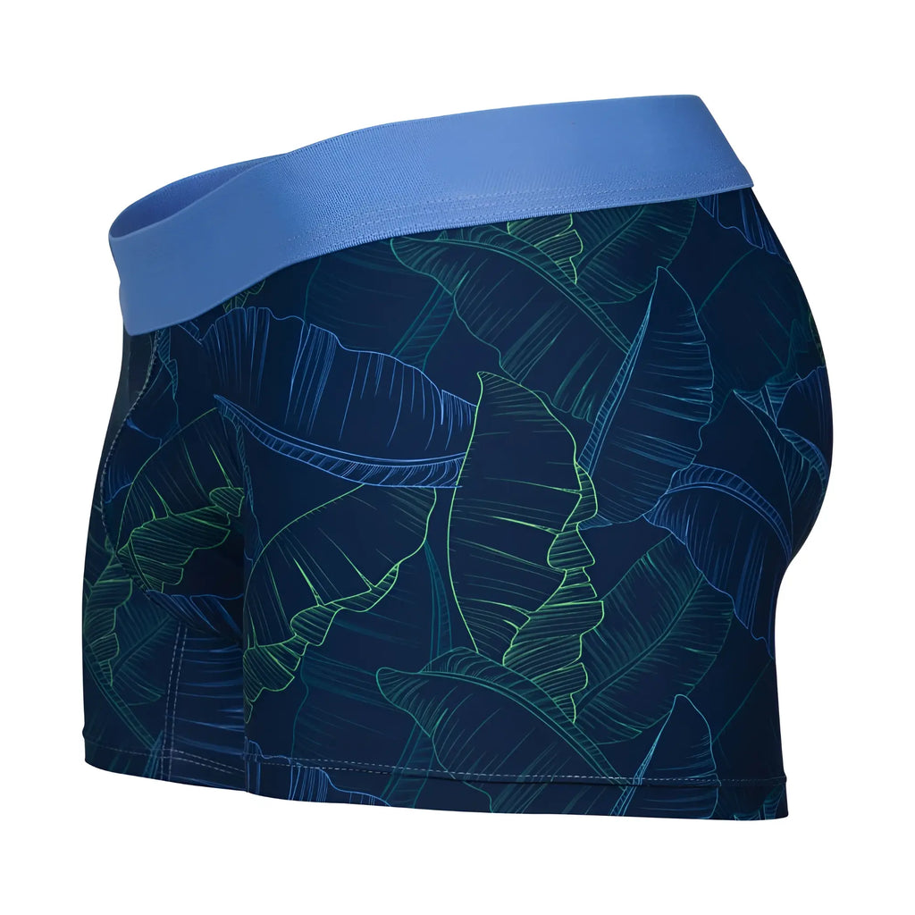 Clever 1727 shape trunks dark blue men’s boxer briefs with blue waistband and glowing teal tropical leaf pattern