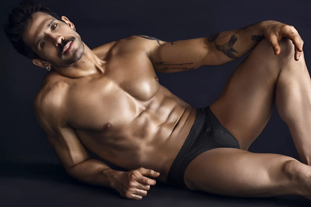 Black textured briefs clever 1743 island swim briefs in black shown from the front for swimwear use