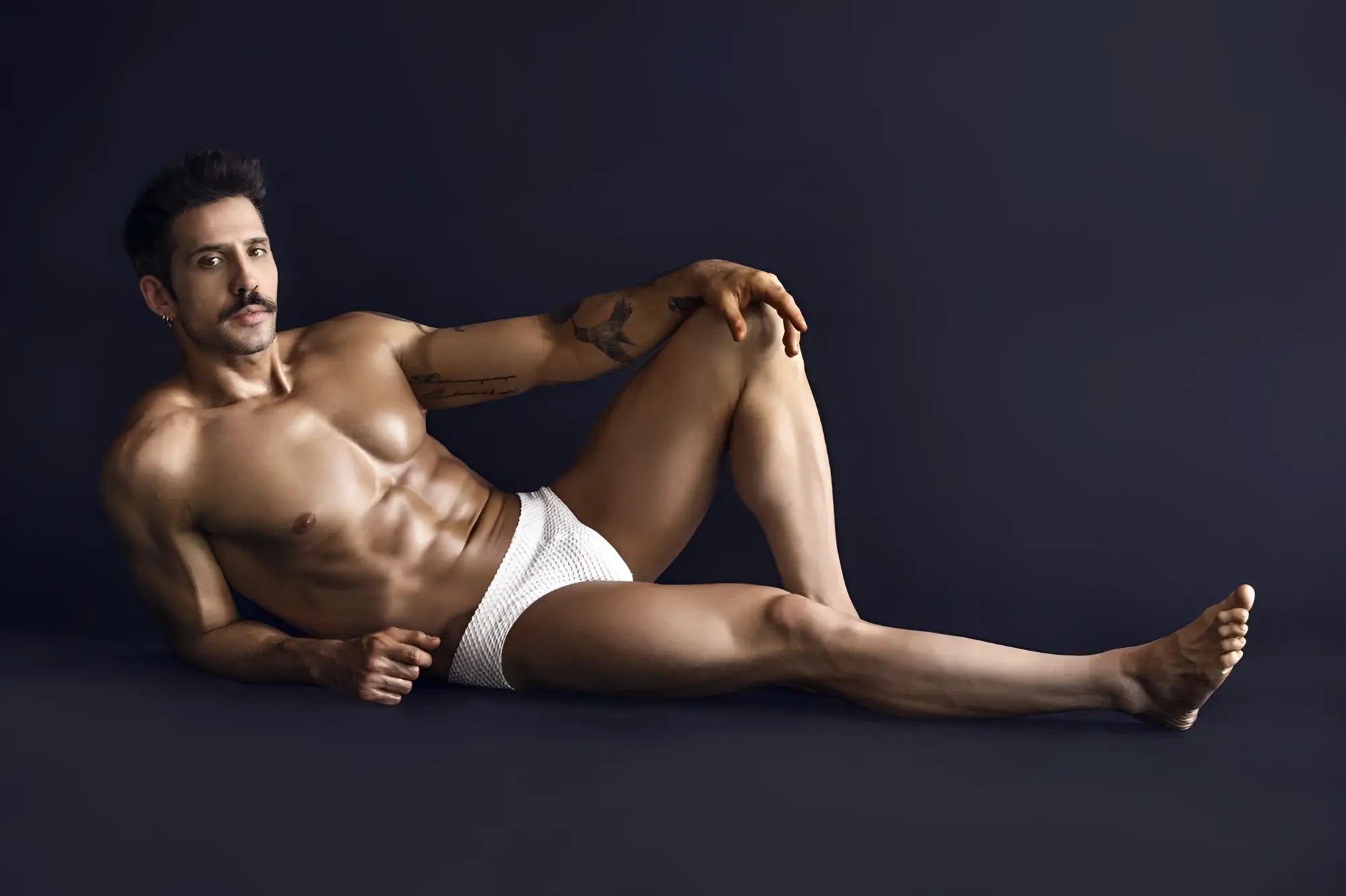 White textured clever 1743 island swim briefs made of breathable fabric for comfortable beachwear