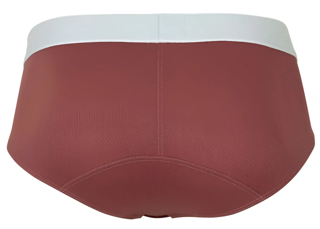 A pair of clever 1863 lecler briefs in rust with a white waistband and smooth fabric texture