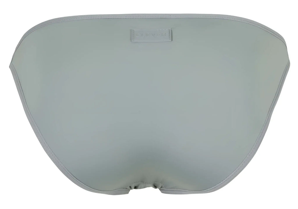 Light gray satin Oomph bikini bottom with subtle seam and small rectangular brand tag by Clever 1865