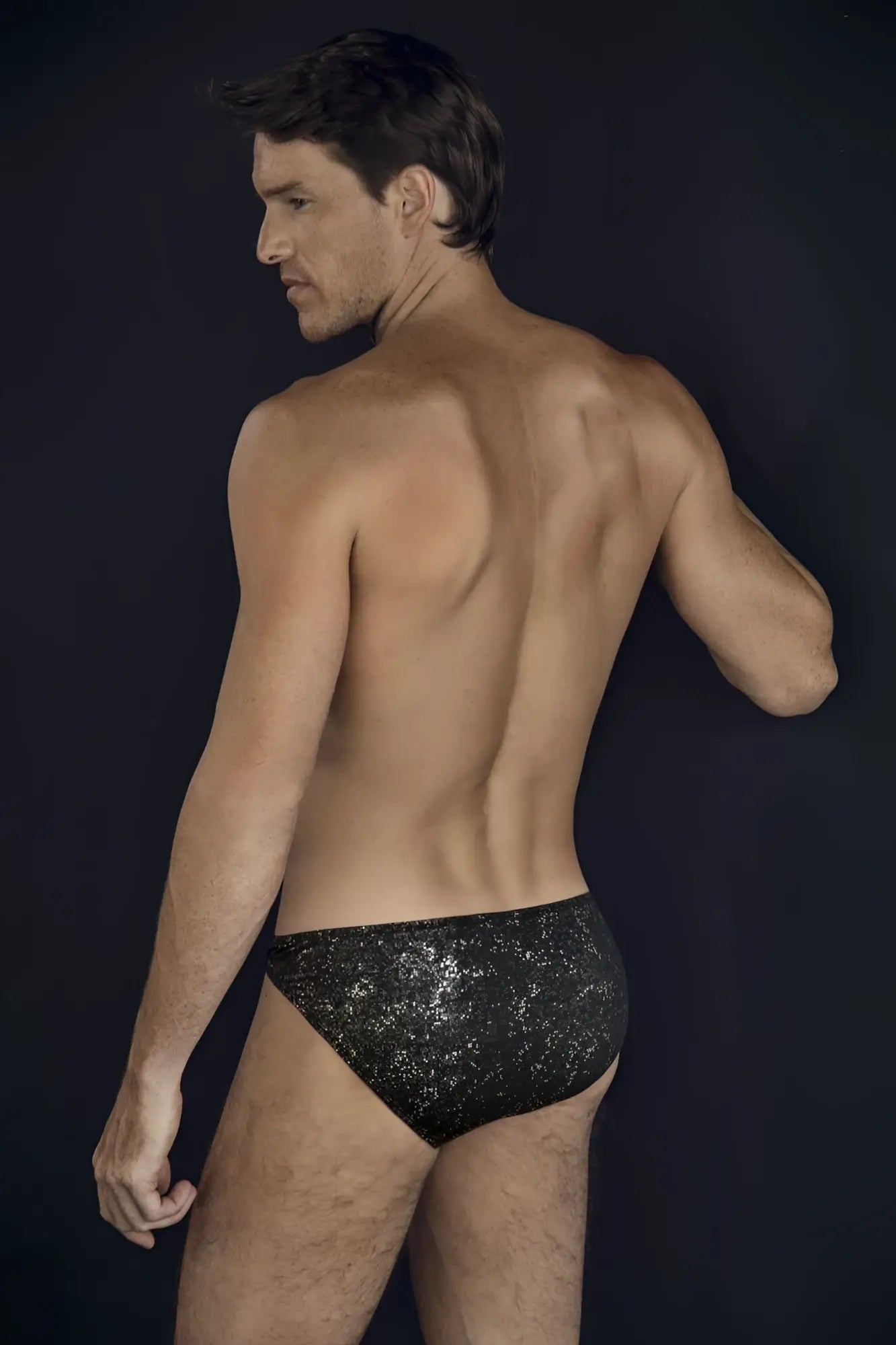 Clever 2040 luxe briefs black swim trunks featuring black sequined fabric for stylish swimwear use