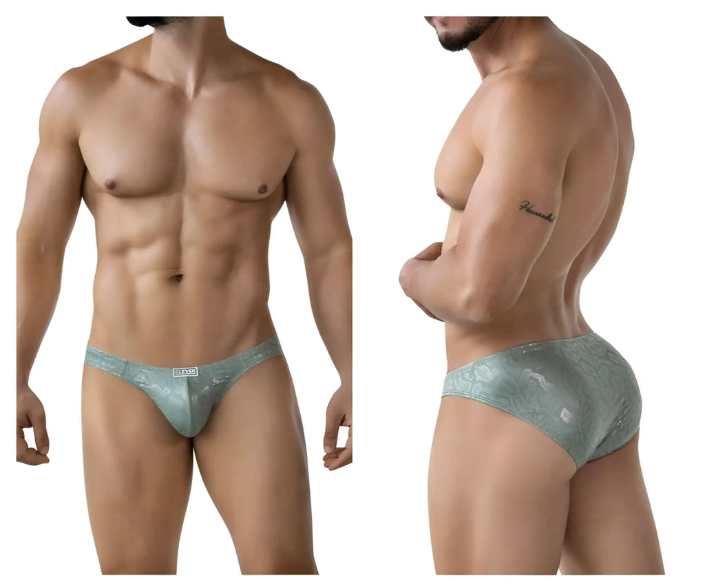 A sleek light teal clever 2040 luxe brief with lace trim shimmering pattern and small white brand tag at waistband