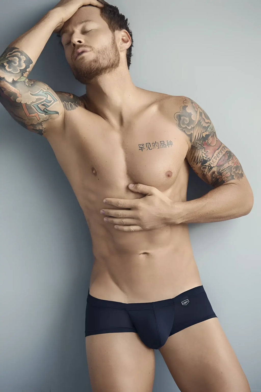 Navy blue clever 2373 australian latin boxer briefs with a small white logo on the waistband in black color