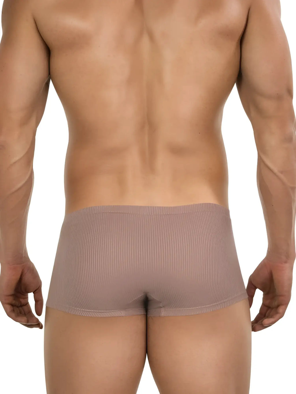 Back view of man wearing Clever 26015 Apolo trunks in ribbed sand fabric, featuring a form-fitting, minimalist design.