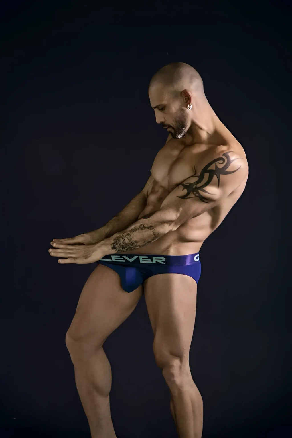 Blue clever australian latin athletic briefs with white clever logo on waistband in beige blue and green colors
