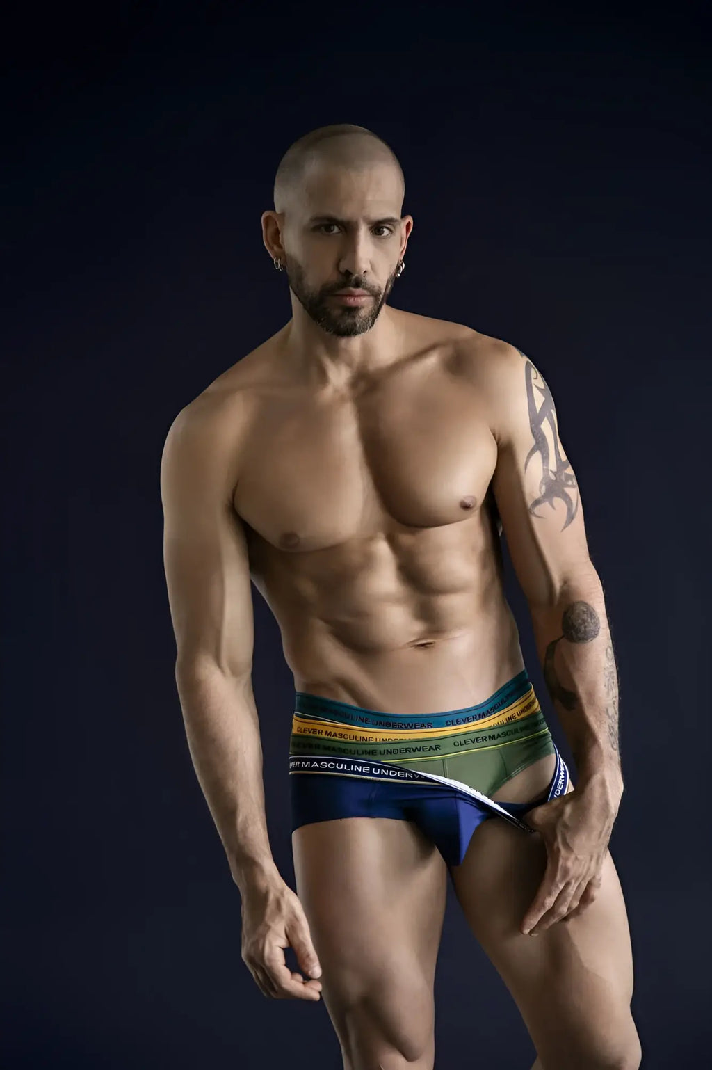 Men’s Clever 519969 Australian Latin briefs in blue petrol green with bold multicolored striped waistband for athletic wear