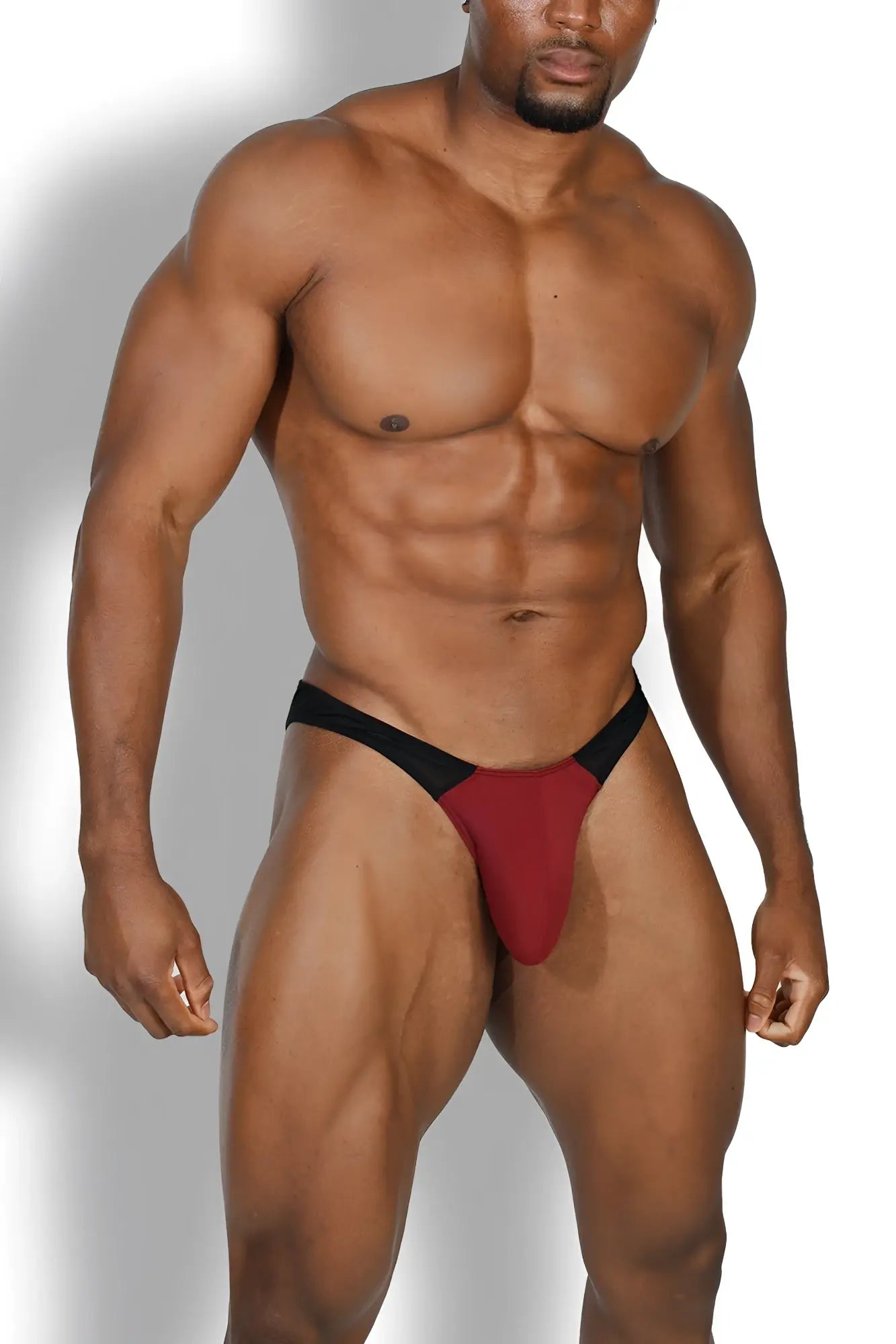 Club-kid mesh bikini briefs in sangria red with black contoured design made from breathable athletic fabric