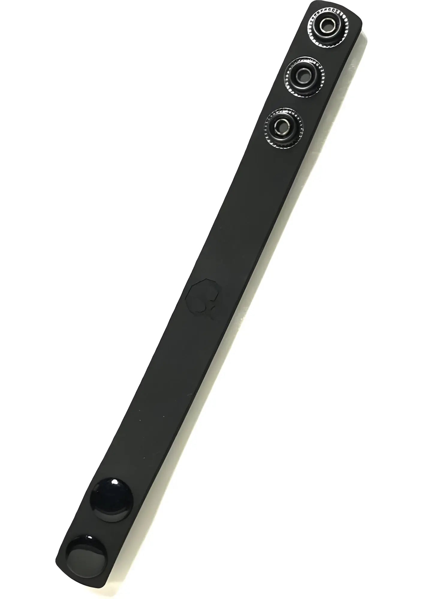 Black leather cock strap with three silver-toned snap buttons and two black circular studs at the ends