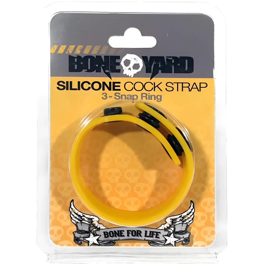 Yellow silicone cock strap with black snap rings branded bone yard for secure and comfortable fit