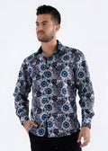 A men’s colored shapes print long-sleeved shirt with bold navy, teal, black, white, and pink geometric floral pattern
