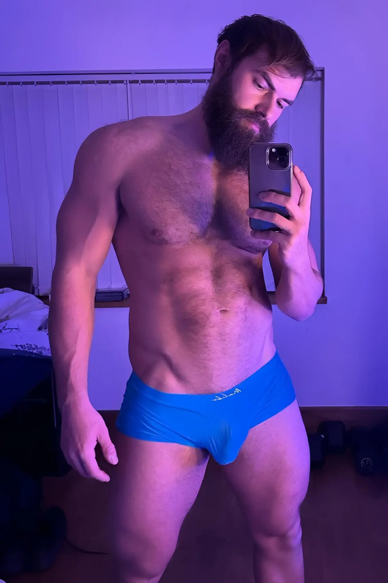Bright blue silky seamless boxer briefs with subtle logo on front for comfortable athletic wear