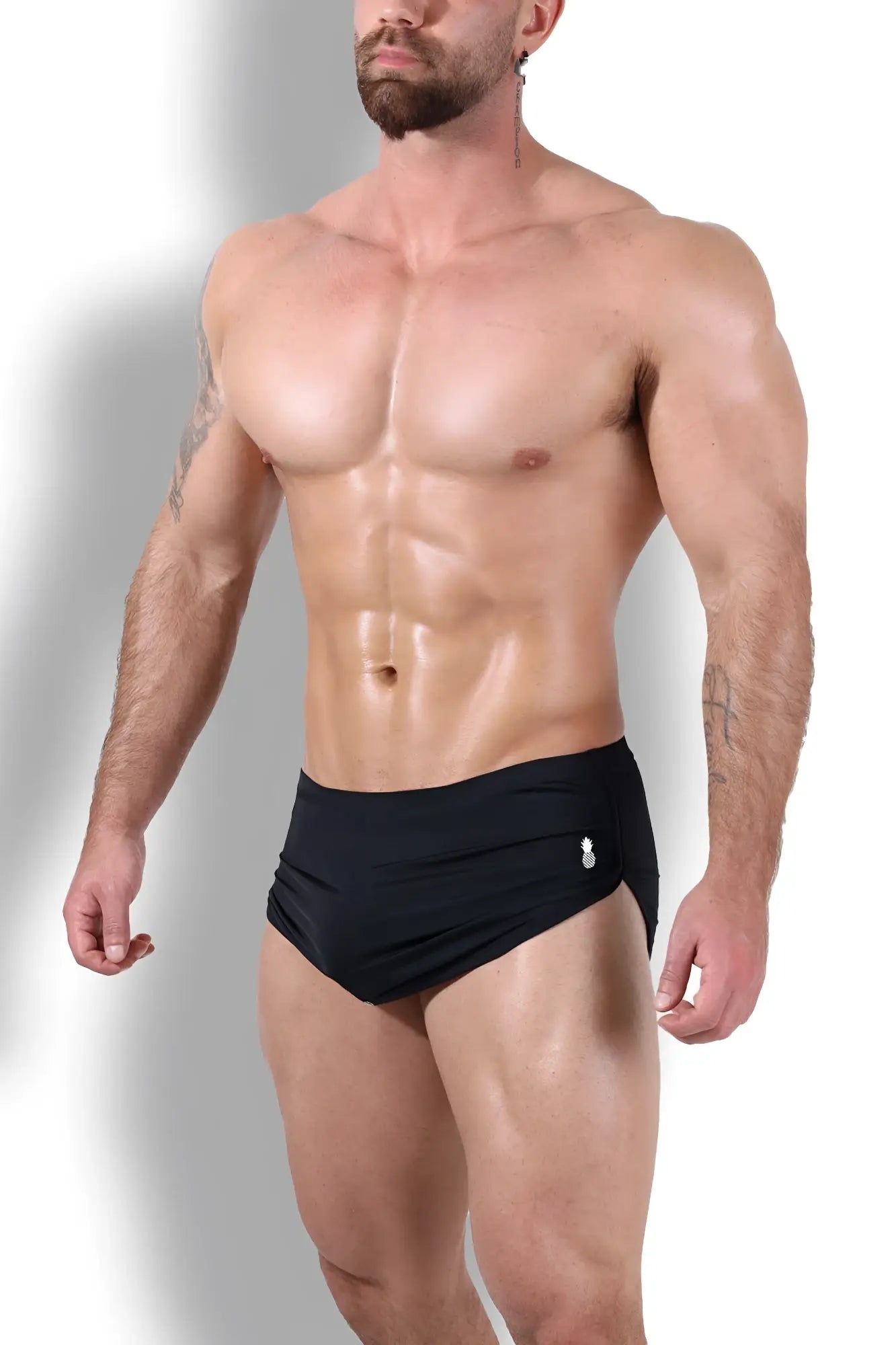 Black cool-dri 2-in-1 athletic briefs with thong lining and small white logo on the side in midnight black color