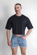Black cool-dry oversized relaxed crop top with short sleeves and round neckline made from breathable fabric