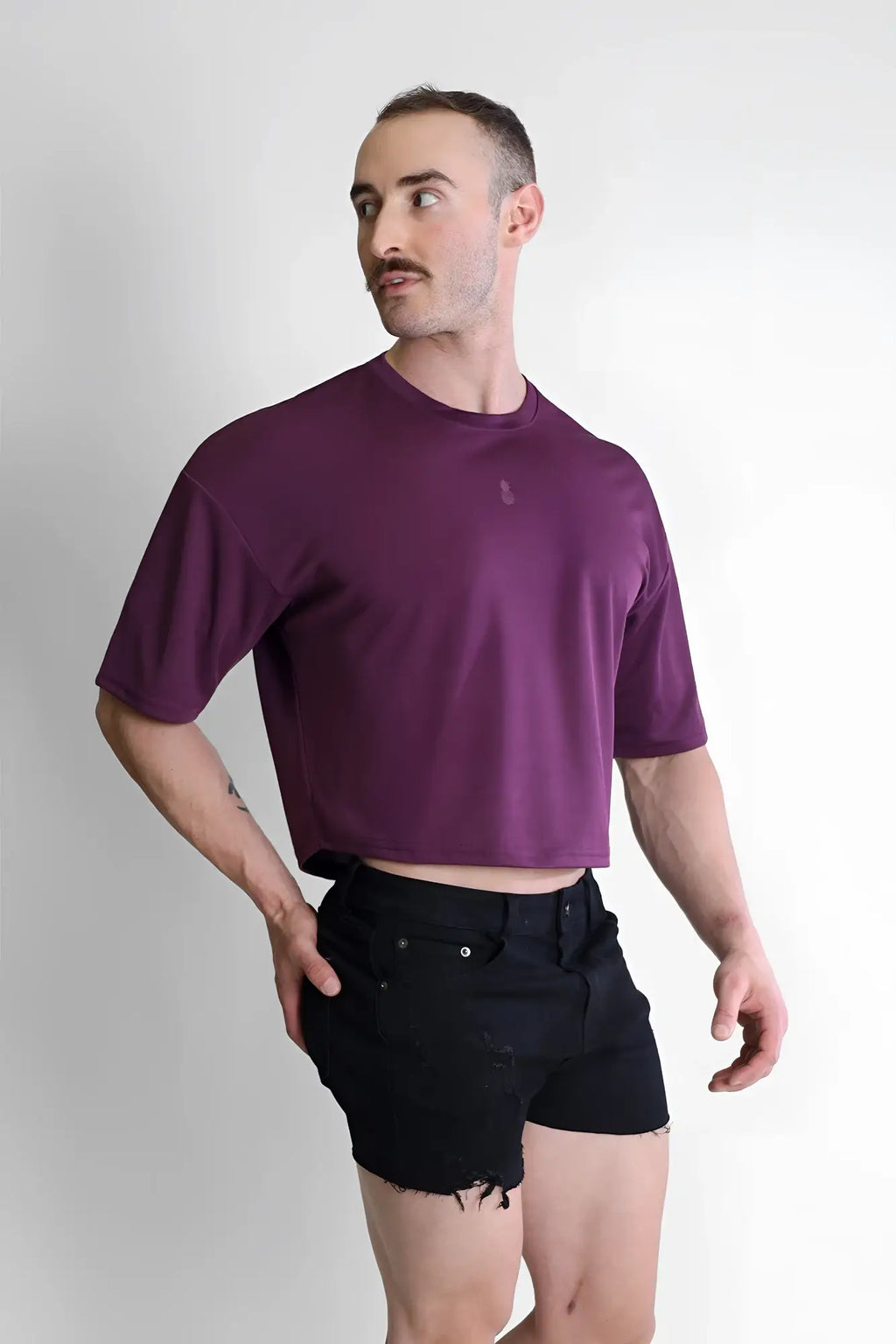 Purple cool-dry oversized relaxed crop top with subtle chest logo perfect for casual comfort and style
