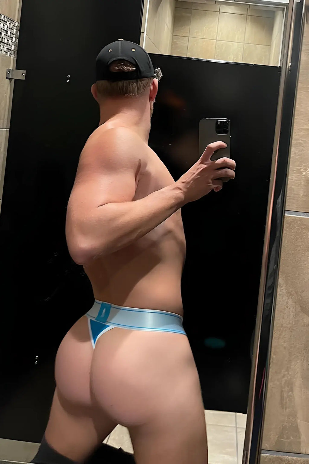 Light blue and white coolmesh pro thong with thin shiny waistband shown from the back in electric blue color