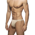 Beige cotton thong with snug form-fitting design made from soft breathable fabric for comfortable wear