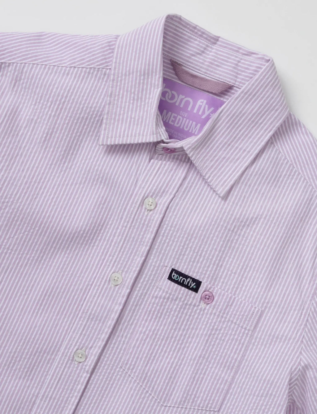 Country Club Fly seersucker shirt with lavender and white vertical stripes and born fly brand label on collar and pocket