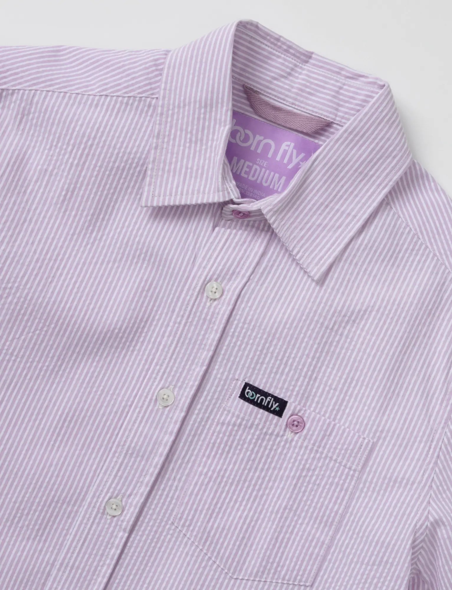 Country Club Fly seersucker shirt with lavender and white vertical stripes and born fly brand label on collar and pocket