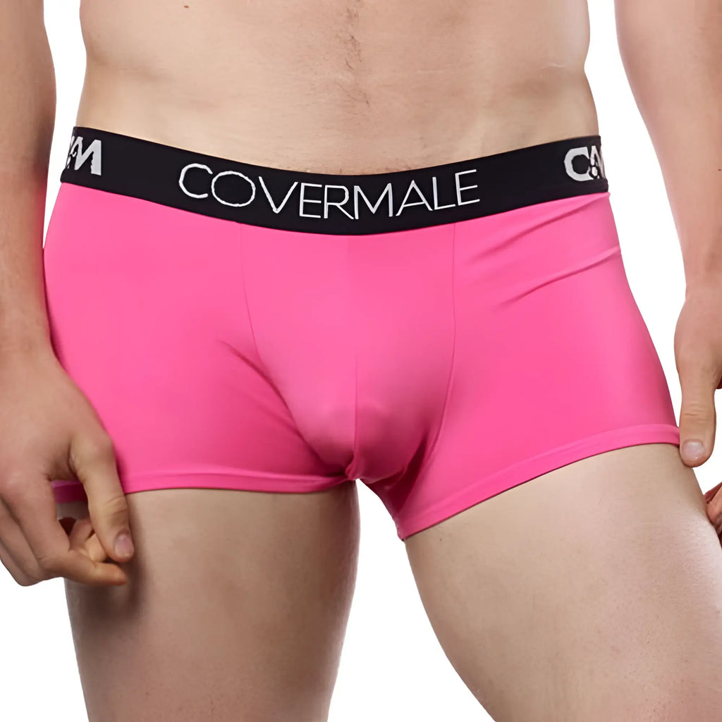 Bright pink cover male cm104 boxer trunk briefs with black elastic waistband and white brand lettering