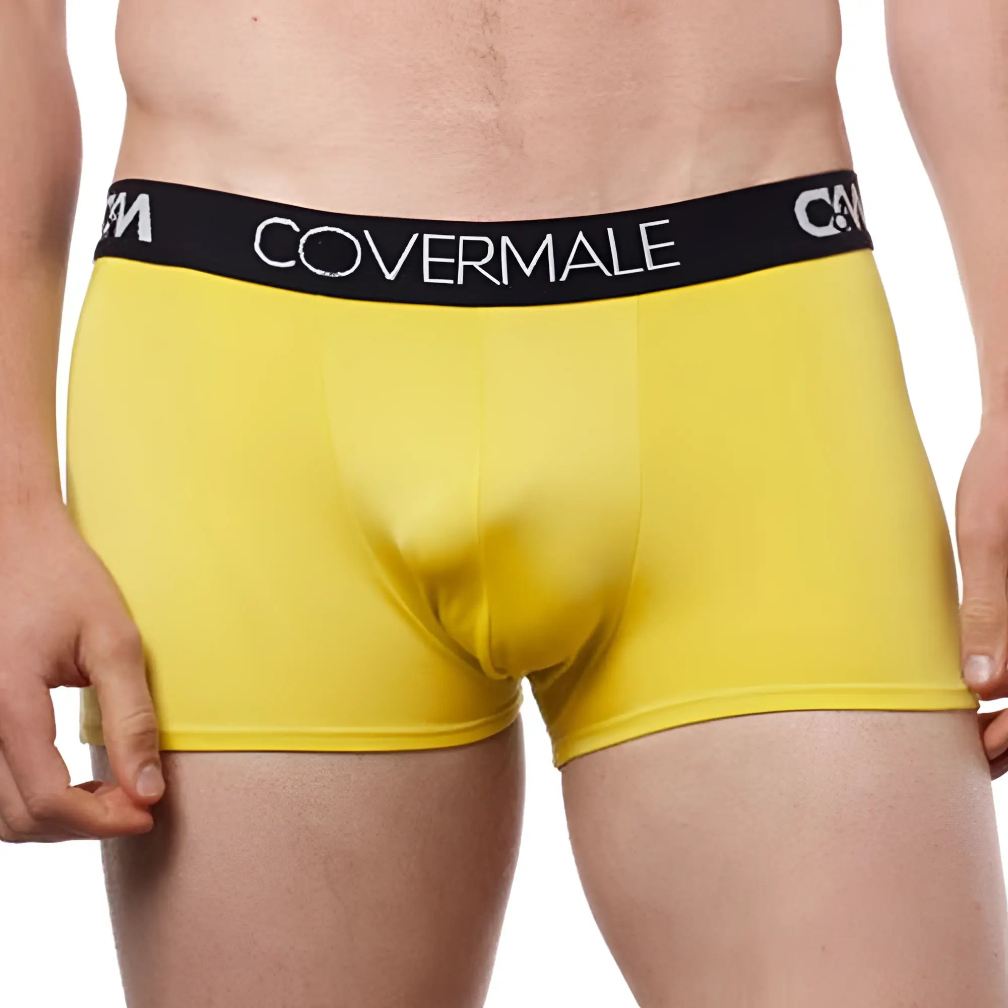 Bright yellow cover male cm104 boxer trunk with black elastic waistband and white logo lettering for men