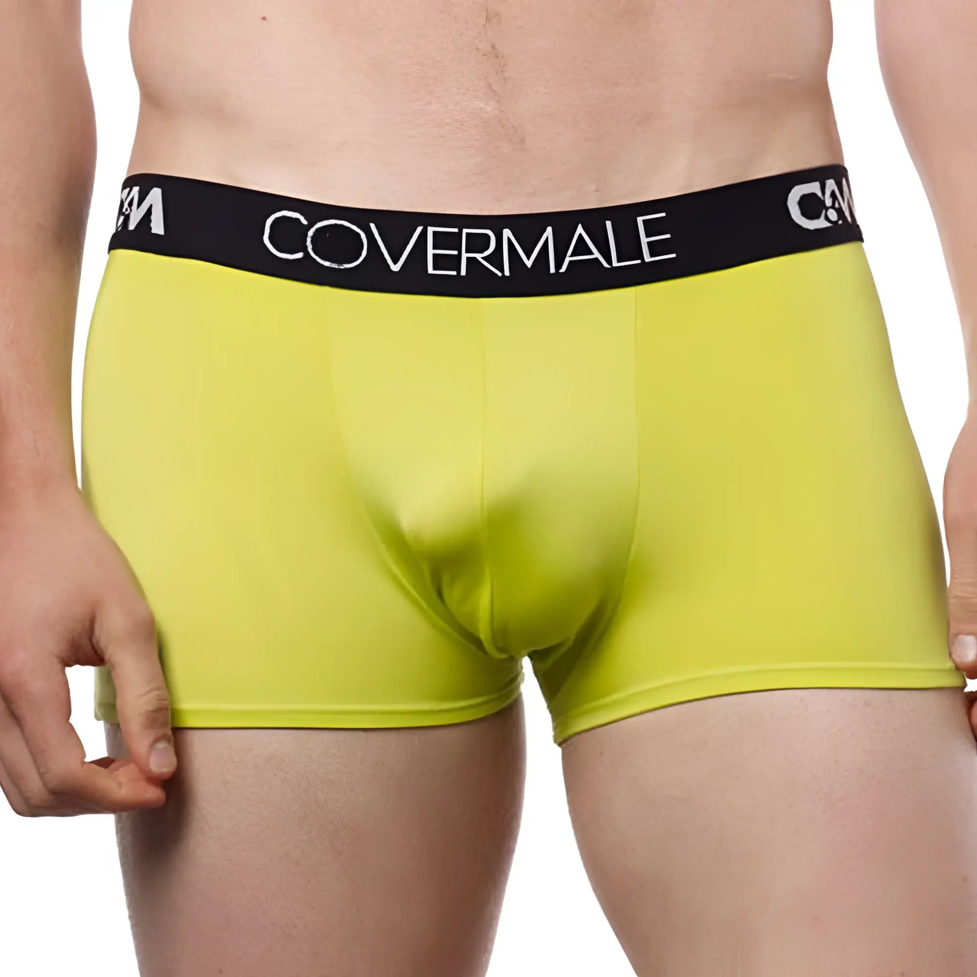 Bright yellow cover male cm104 boxer trunk with black elastic waistband and white brand name lettering