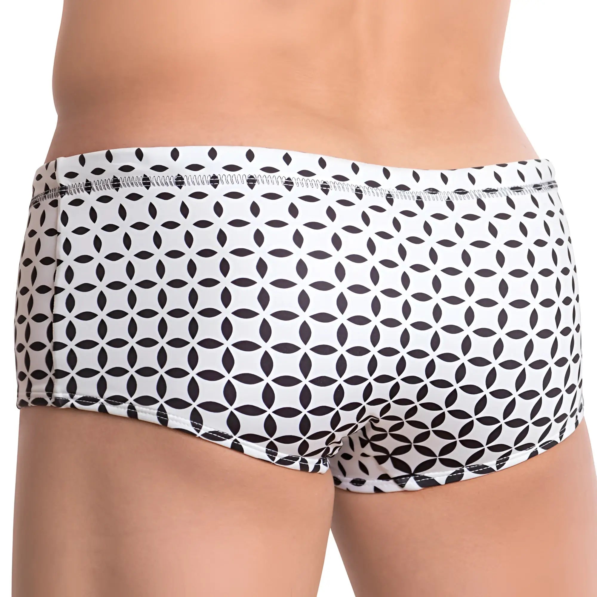 White cover male cmh008 swimwear swim trunks with a black geometric overlapping leaf pattern for beach use