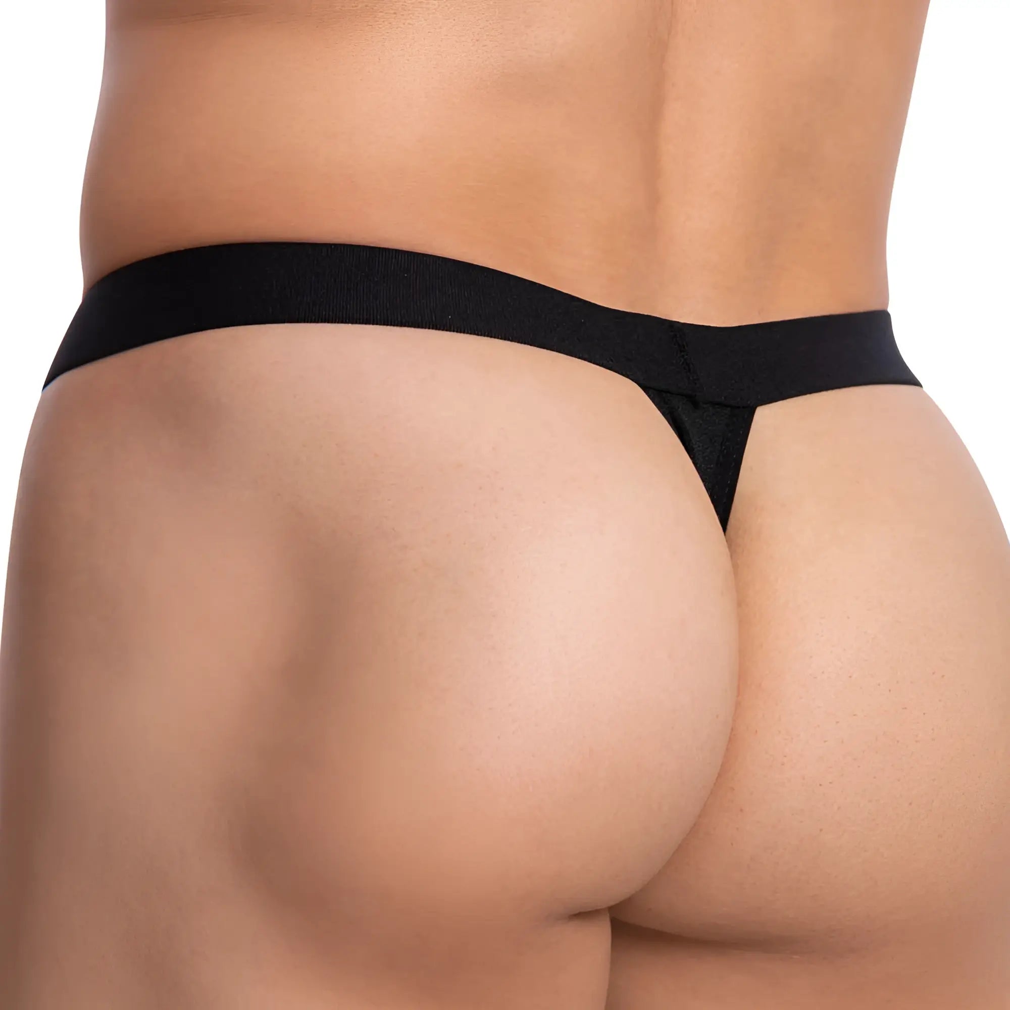 Black Cover Male CMK067 thong made of smooth stretchy fabric with narrow waistband and minimal coverage shown from the back